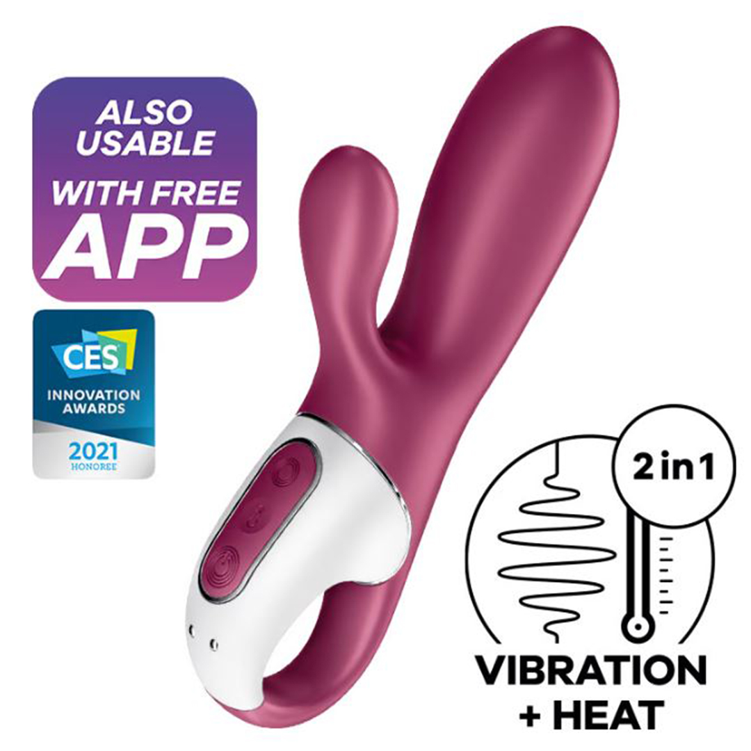 Išmanusis vibratorius su šildymo funkcija "Hot Bunny" – Violetinis 
 
„Hot Bunny“ pasižymi labai ypatinga ir novatoriška funkcija kiekvienai kurią vilioja  dviguba G taško ir klitorio stimuliacija.  Vibratorius gali būti įšildytas  iki 39 °C  ir taip skleidžia malonią šilumą kuri suintensyvina G-taško masažą ir ypač atpalaiduoja. 
„Hot Bunny“  idealiai tinka pradedantiesiems  dėl savo simpatiško dydžio. O žiedo formos rankenėlė patogiai telpa rankoje, kai atmosfera įkaista. Nepaisant savo dydžio, šis vibratorius pasižymi stipria ir galinga vibracija kartu  su 12 vibracijos režimų,  kuriuos taip pat galima  valdyti naudojant „Satisfyer Connect“ programėlę.  
Programėlė skirta „Android“ ir „Apple iOS“ vartotojams.  Kartu su šia galimybe, jūsų žaidimai perskiles į kitą lygį - be programėlės valdymo, taip pat galite kurti savo vibracijos programas arba perduoti vibratoriaus valdymą partneriui. 
Ar norėtumėte, kad jus tenkintų mėgstamos muzikos ritmu?  Tuomet šis vibratorius jums puikiai tinka. Programėlė leidžia visas mėgstamas  „Spotify“ dainas pajausti kaip vibracijas.  
Šis mažasis draugas yra idealus kompanionas kelionėse ir visur kitur - net duše ar vonioje dėl  vandeniui atsparios (IPX7) konstrukcijos.  Baterijai išsikrovus, lengvai įkraukite naudojant pridedamą  USB įkrovimo laidą.  
   
Tinkamai prižiūrint  šis vibratorius tarnaus tikrai ilgai. Prieš ir po kiekvieno naudojimo nuplaukite jį šiltu vandeniu ir švelniu muilu arba specialiu žaislų valikliu. Leiskite išdžiūti natūraliai. Šį sekso žaislą laikykite stalčiuje, specialiame maišelyje arba kitoje vietoje, kurioje nėra dulkių. Laikykite jį atokiau nuo kitų sekso žaislų. Nepalikite tiesioginiuose saulės spinduliuose ir niekada nelaikykite jo dideliame karštyje. 
  
Rekomenduojama naudoti kartu su vandens pagrindo lubrikantu.  Nenaudokite silikoninių lubrikantų, aliejų ar kremų, nes jie gali sugadinti prietaiso medžiagą ir apriboti jo veikimą bei galiojimo laiką.  
  
Kodėl jums reikalingas vibratorius? 
Vibratorius ar klasikinis vibratorius yra sekso žaislas, naudojamas ant kūno maloniai seksualinei stimuliacijai kelti. 
Vibratoriai gali būti naudojami tiek solo, tiek poroje ar kelių žmonių žaidimams kartu. Taip pat jie gali būti naudojami erogeninėms zonoms, tokioms kaip klitoris, vulva ar makštis, varpa, kapšelis ar išangė, siekiant seksualiai stimuliuoti, išlaisvinti seksualumą ir pasiekti orgazmą. 
Vibratoriai yra rekomenduojami sekso terapeutų moterims, kurioms sunku pasiekti orgazmą masturbacijos ar lytinių santykių metu.